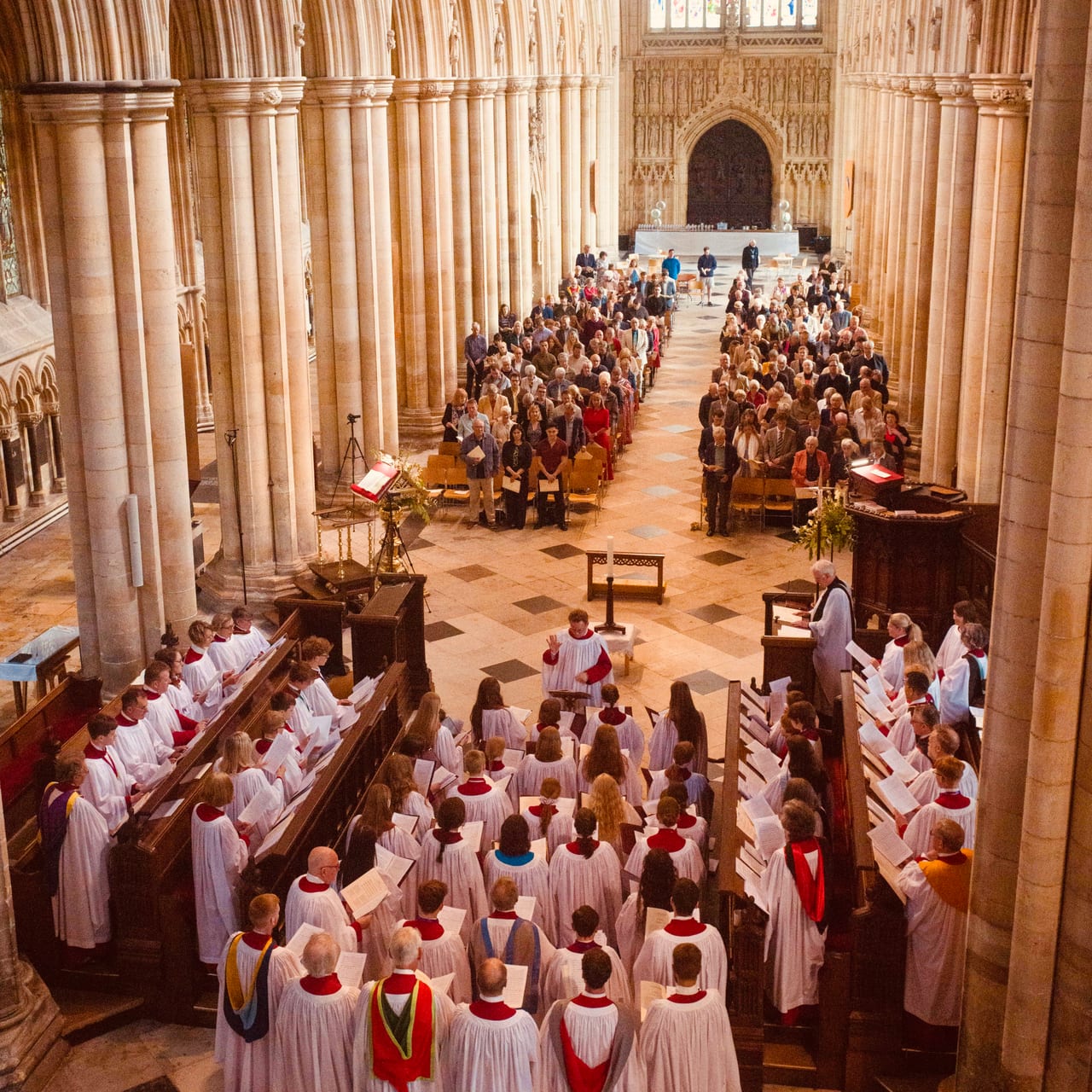 Choral Evensong in the Minster — the choir, congregation and clergy gathered in the nave.